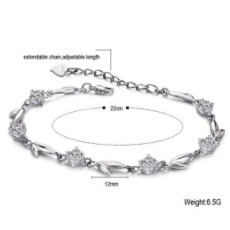 Bekannt Für Sein Hochwertiges, Platiniertes Titanarmband In Blattform Mit Strasssteinen